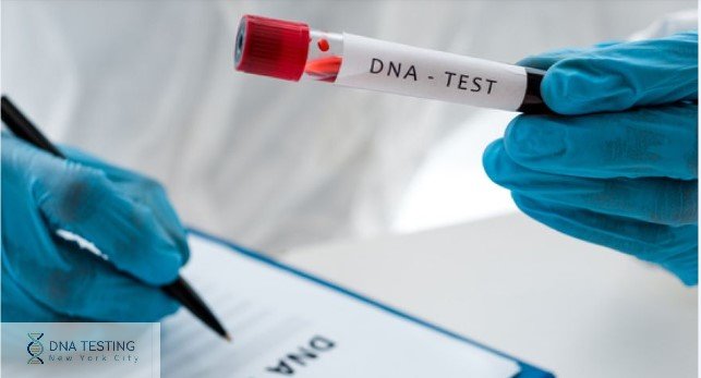 Dna test lettering on a white label. dna blood test in the hand of a doctor or scientist in the lab. blood sample in a glass tube